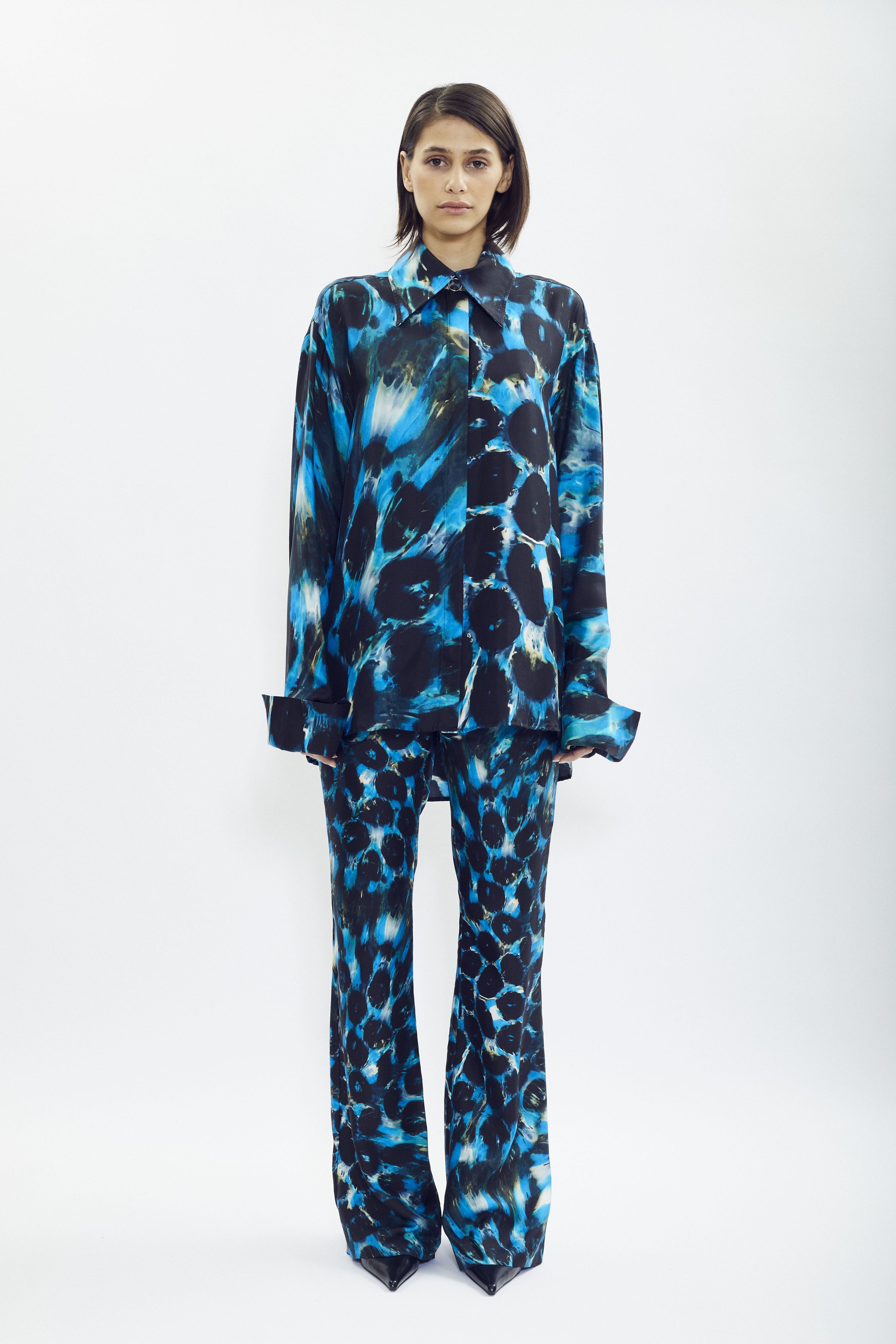 Silk shirt with SONNEY’s signature print and green accents, flowing oversized fit