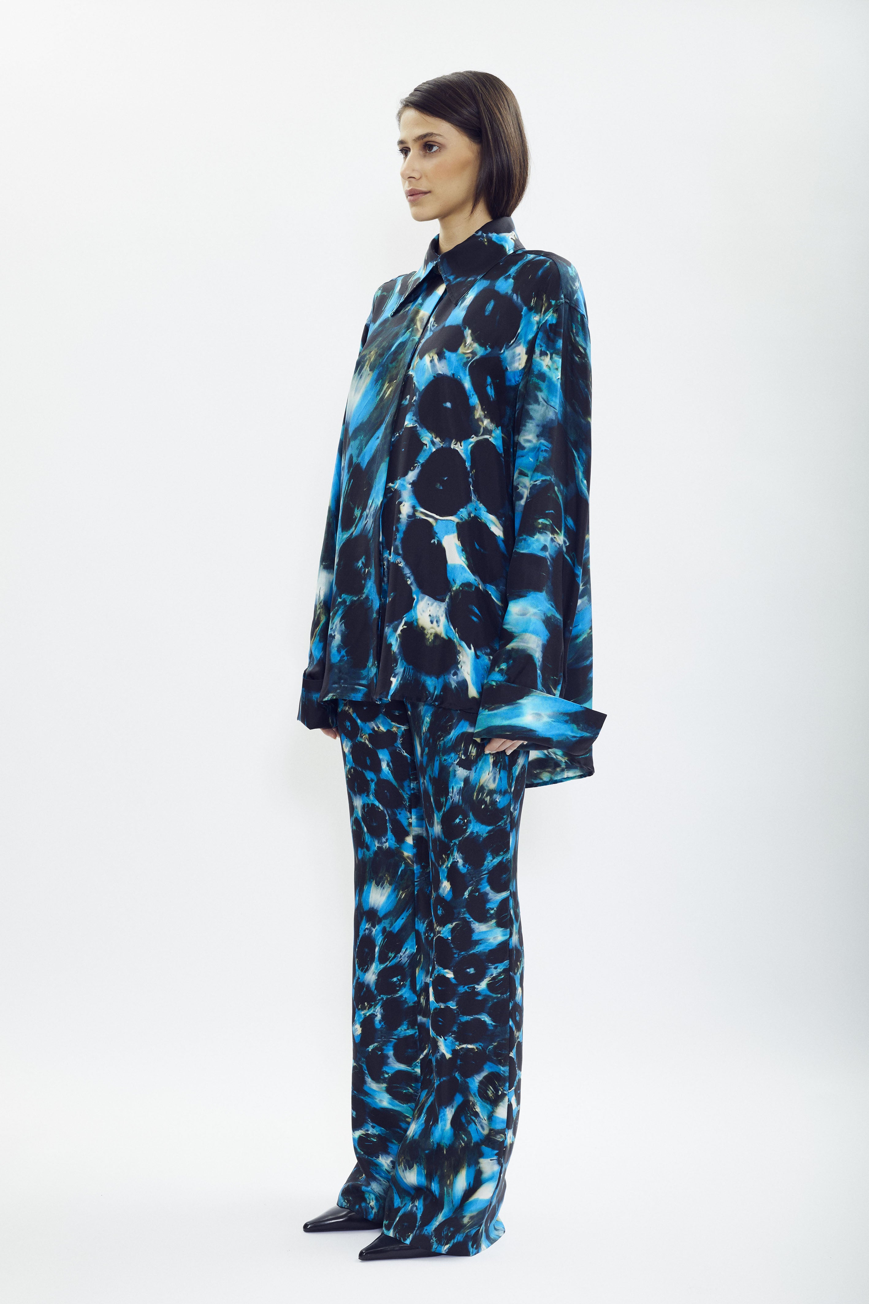 Silk shirt with SONNEY’s signature print and green accents, flowing oversized fit